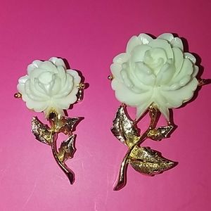 2 Lucite carved rose brooches